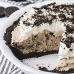 Oreo Pudding Pie, topped with whipped cream and crushed Oreos, ready to serve