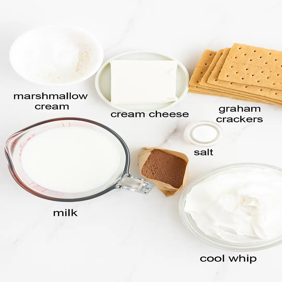 Frozen S’mores Ingredients for frozen s’mores with chocolate pudding, Cool Whip, graham crackers, and marshmallow creme