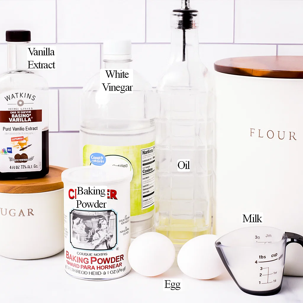 fluffy Japanese soufflé pancakes Ingredients for fluffy Japanese soufflé pancakes laid out on wooden kitchen counter